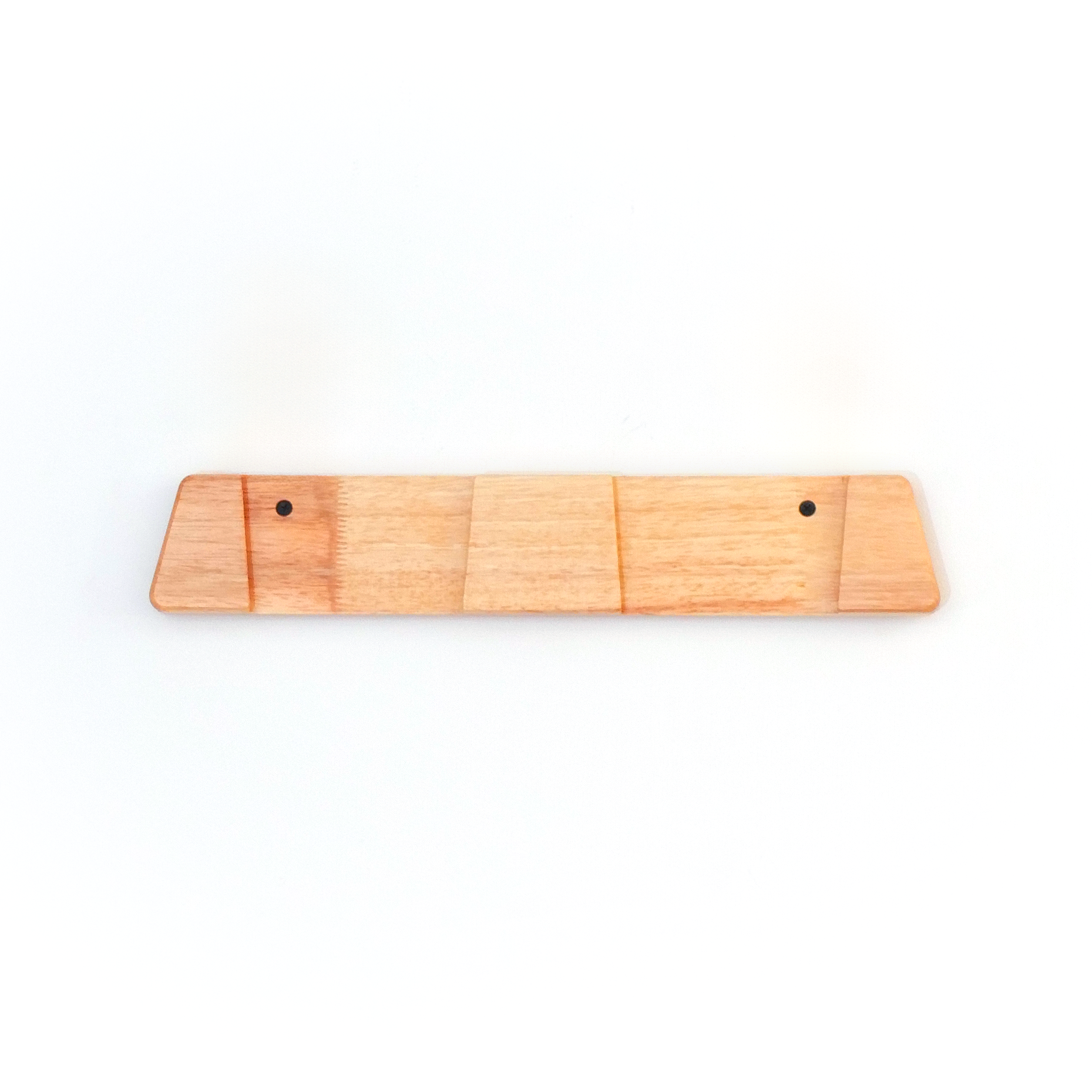 A light natural wood ski rack or board with two small pre-drilled holes, shown against a plain white background.